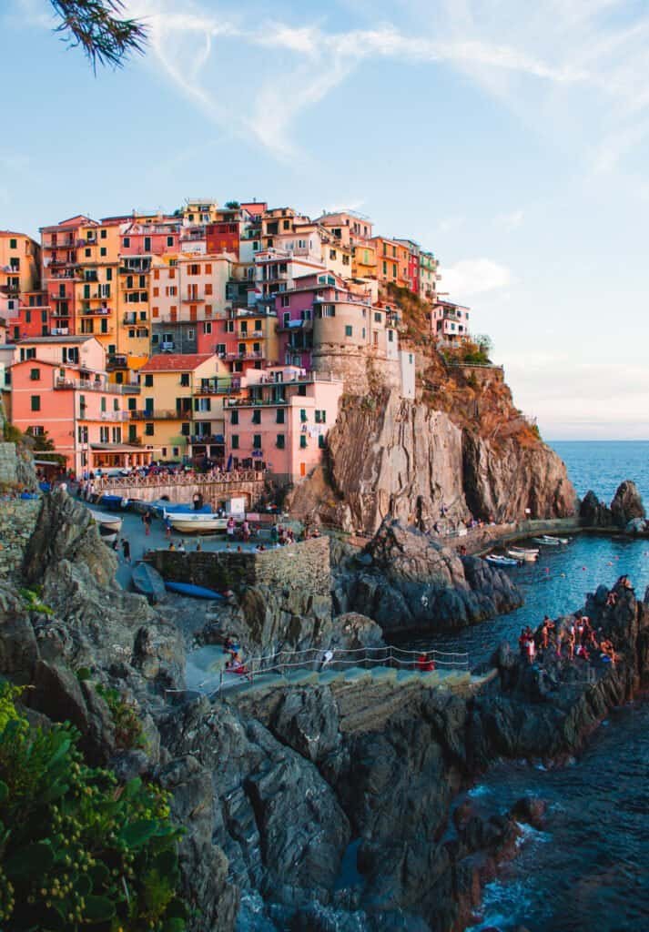 view of the amalfi coast with the city in the background and the sea in the foreground