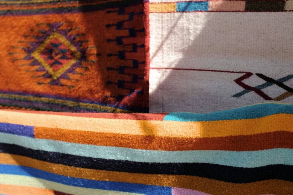 close up of colorful textiles resembling the sunset