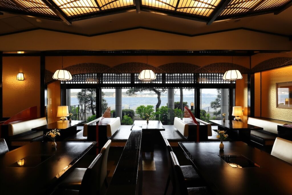 Kamakura park hotel woody and moody lobby with windows in the background with ocean views of sagami bay