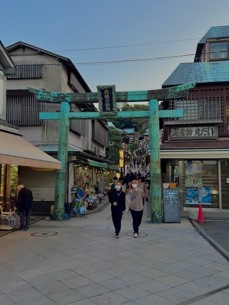 picture of bronze torii gate signaling entrance to nakamise-dori street