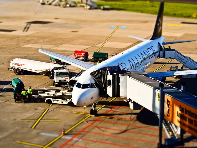 airline departures board showing fewer flights to Europe (europe freezes us travel)