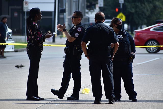 Police tape at a crime scene in a residential area (aaron spencer)