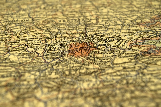 traveler looking at map in European city